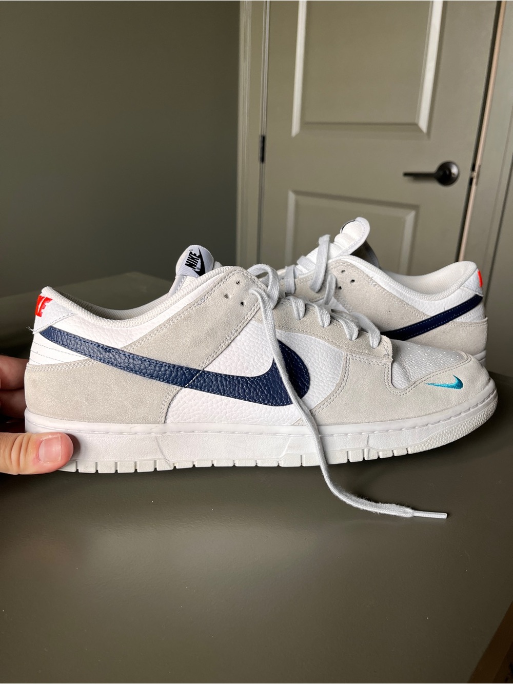 Nike Low-Top Dunk Sneakers in White, Light Gray & Navy with Teal Accent